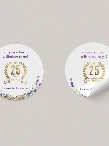 A pair of the 25th anniversary stickers, showing the beautiful design with the celebratory phrase "25 years down, a lifetime to go!". These small details help carry the event's theme through every element.