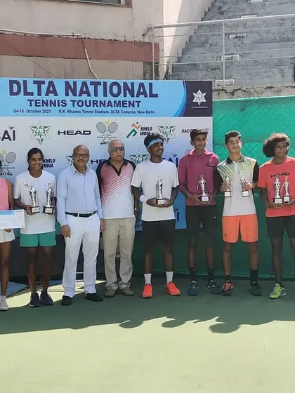 All the winners and runners-up from the DLTA National Tournament posing with officials.