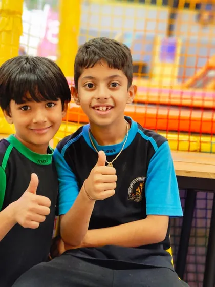 Thumbs up from these two happy students. Their smiles are the best review we could ask for.