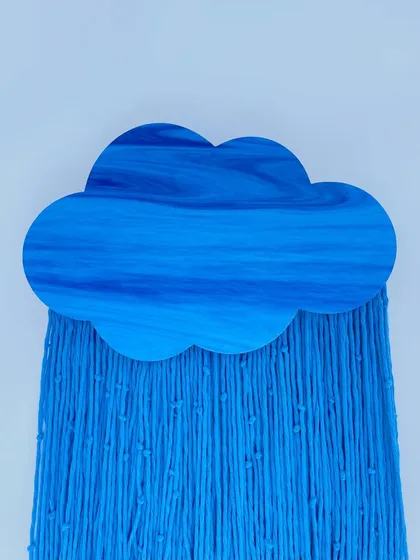 This close-up highlights the detailed marbling effect on the blue wooden cloud. It showcases the quality of the water-resistant HDMR MDF and the rich color that makes this piece a standout work of fiber art.
