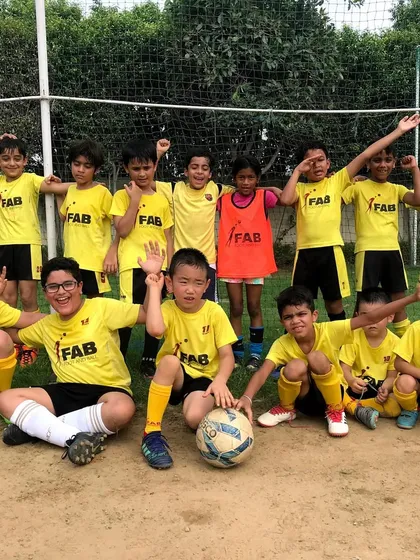 A happy team photo. We believe in steady progress and unwavering confidence, celebrating every victory along the journey.
