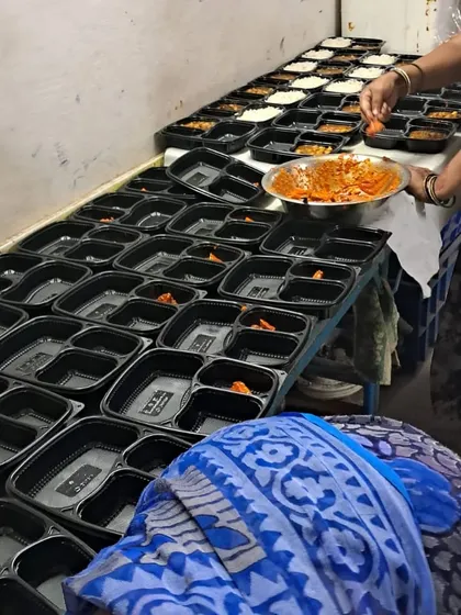 Behind the scenes of a massive order for over 1,000 lunch boxes for St. Xavier’s College. Our team works with precision and care to ensure every single meal is perfect.