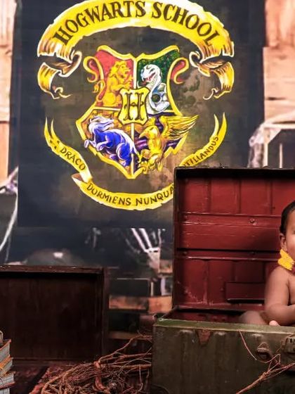 A magical moment from our Harry Potter themed shoot. This little wizard is having a great time popping out of a trunk, ready to cast a spell.