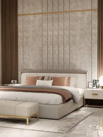 This bedroom design uses a warm, neutral color palette with a fully upholstered headboard wall for a soft, luxurious feel. We incorporated wood paneling and arched niches to add architectural interest and warmth.