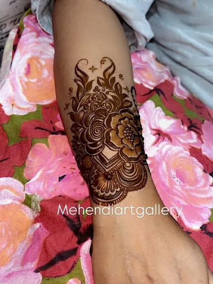 The same floral cuff design, shown from a slightly different angle to highlight the shading and linework. This style is perfect for brides who love bold, nature-inspired patterns.