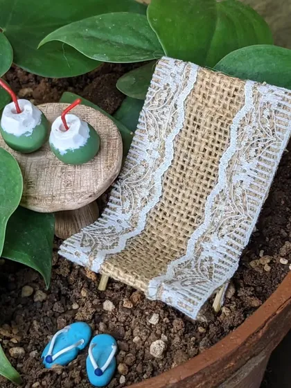 A close up of the handmade beach chair and tender coconuts. It's all about the small details.