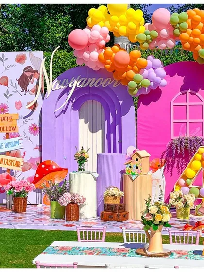 I transformed this backyard into an enchanting fairyland for a magical 4th birthday. This immersive setup features a custom-built fairy house backdrop, vibrant balloon garlands, and whimsical details that invite little guests into a world of wonder.