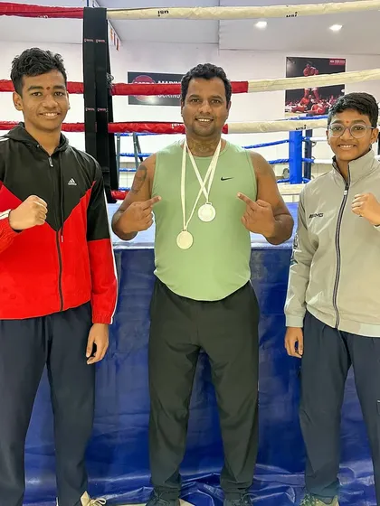 Coach Darshak Pawase with our silver medalists, Siddhesh and Riddhi. A proud moment for the academy.