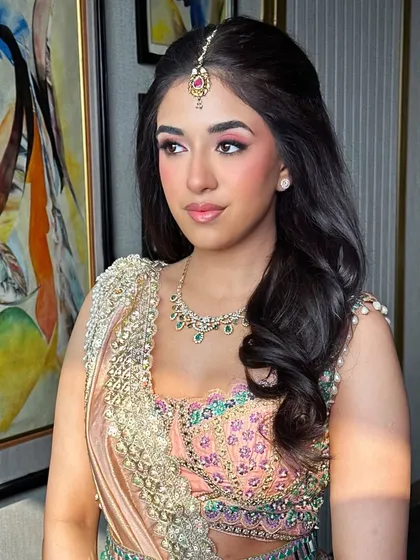 The sunlight catching the beautiful highlight on her cheeks. This pastel glam look is all about creating a lit-from-within glow that looks natural and fresh.