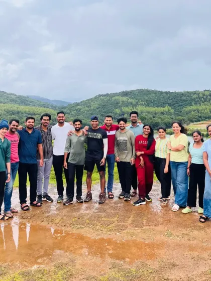 A smaller group enjoying the view from a viewpoint after some rain. The post-rain freshness is something to be experienced.