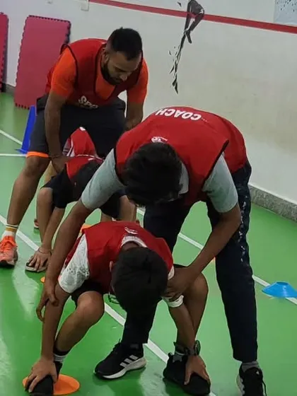 Our coaches provide hands-on guidance, correcting posture and ensuring each child performs the drill safely. This personal attention helps build a strong athletic foundation.