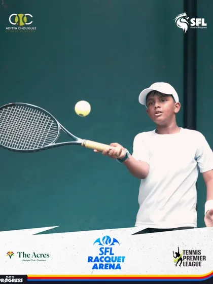 Eyes on the prize. A young player connects with the ball, showcasing the determination and skill we cultivate in our tennis academy.