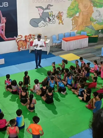 A coach addressing the young participants before the start of our inter-club competition. We focus on sportsmanship and giving your best effort.
