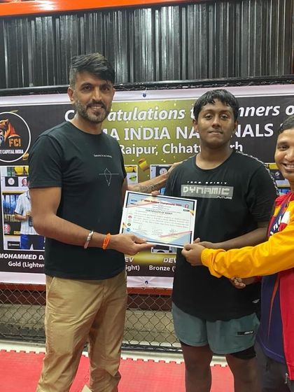 Fight Capital - MMA & Combat Fitness Training Our Fight Team: Forging Champions photo 29