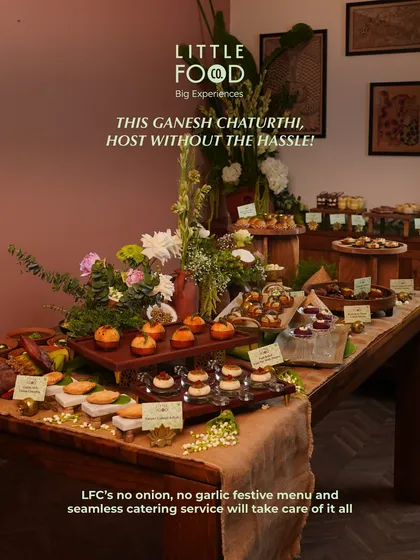 This is how we do festive celebrations. We design stunning, full-spread tablescapes with bespoke menus, like this no onion, no garlic spread for a Ganesh Chaturthi gathering, so you can host without the hassle and enjoy the party.