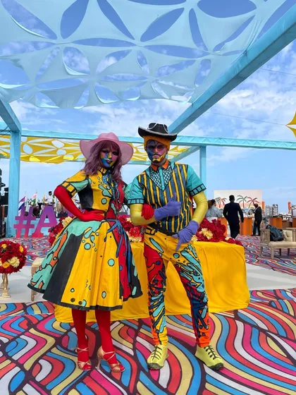 I love bringing beautifully choreographed chaos to life. These performers, dressed in vibrant, pop-art-inspired costumes, were part of a carnival-themed event where every detail, from the decor to the entertainment, was designed to be an immersive, high-energy spectacle.