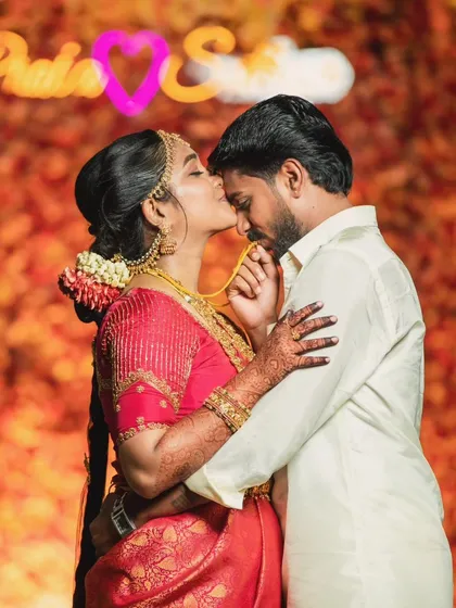 A sweet moment between the bride and groom. Her makeup is subtle enough to let her natural emotions shine through.