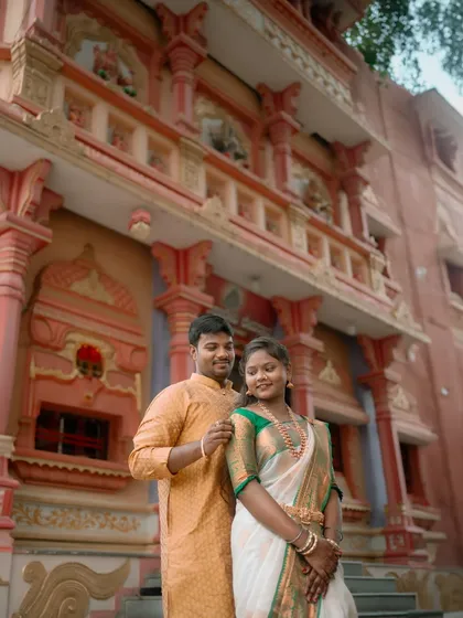 A portrait of the couple outside the temple, with its intricate architecture visible in the background. This shot captures both their connection and the beauty of the location.