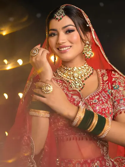 The bokeh lights in the background add a magical touch to this portrait. The makeup is designed to look stunning in any lighting, from daylight to evening festivities.