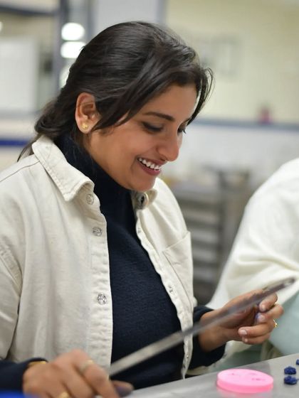 A happy moment in the bakery. We are always experimenting with new designs and techniques to bring you the best cakes.