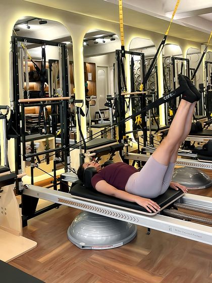 The feet in straps series is a client favorite for a reason. It lengthens the hamstrings, strengthens the core, and improves hip mobility, all while feeling amazing.