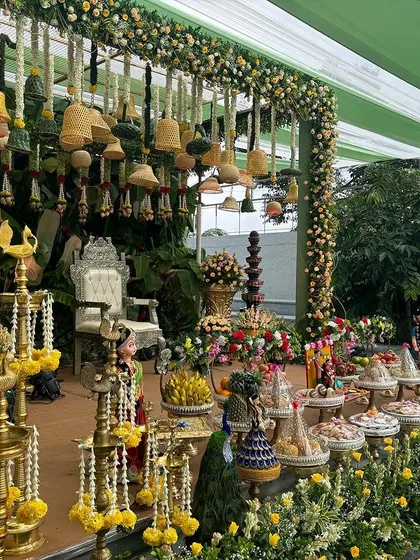 An angled view of the stage with hanging yellow bells.