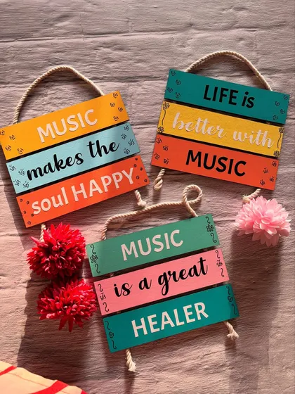 A flat-lay of the music quote hangings, perfect for gifting to a music enthusiast.