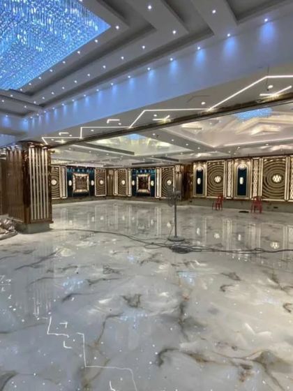 This is the Grand Utsav Banquet in Kharghar during its construction phase. You can see the grand scale and modern design with marble flooring and intricate wall panels, designed for events up to 800 guests.