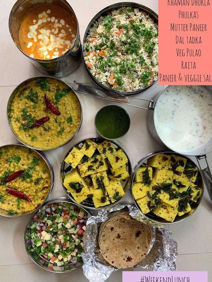 A wholesome weekend lunch spread. This meal featured Khaman Dhokla, Mutter Paneer, Dal Tadka, and Veg Pulao, served with fresh phulkas and salad.