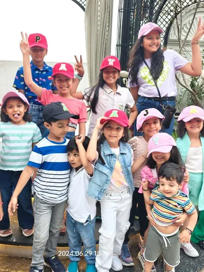 A group of happy kids showing off their personalised caps. We love seeing our creations bring so much joy.