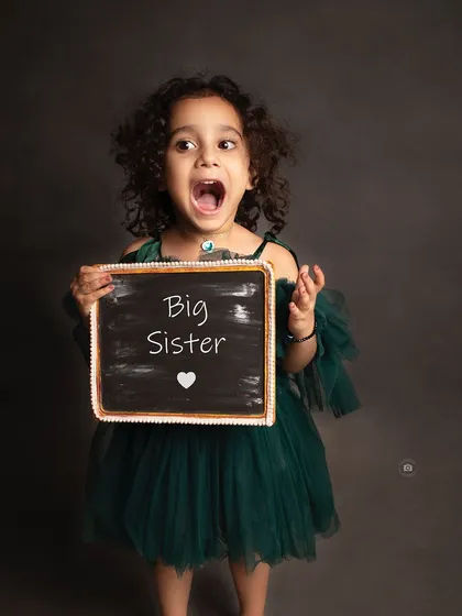 The pure excitement of becoming a big sister. I love capturing these announcement photos, full of personality and joy, as your family prepares to welcome a new member.