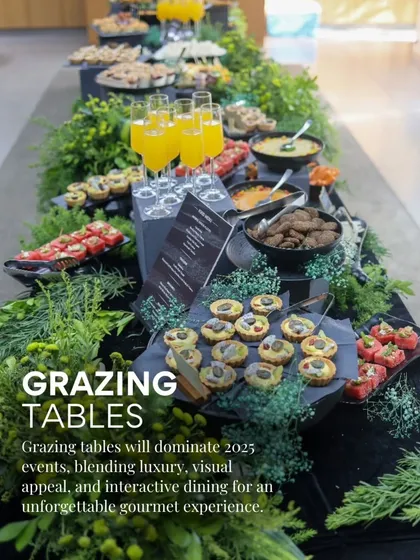This is what we mean by a feast for the eyes. Our grazing tables are interactive dining experiences, blending luxury and visual appeal with lush greenery and an abundance of gourmet food, perfect for unforgettable events.