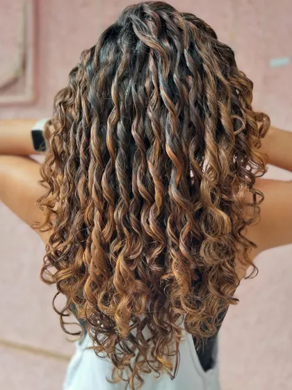 The back of these caramel kissed curlylocks. The color is so warm and rich, and the curls are perfectly defined.