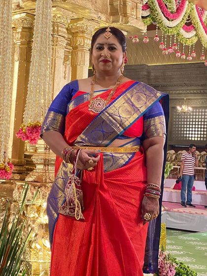 A closer portrait of Swetha Babu, her traditional attire and confident poise making a powerful statement of cultural pride.