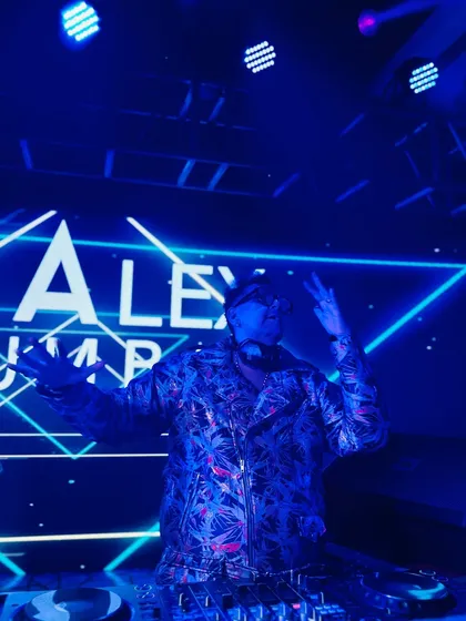 Hands up, feeling the vibe. This is me embracing the atmosphere of the party, fully immersed in the moment.