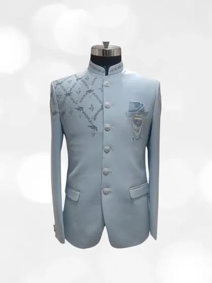 Our exclusive Jodhpuri collection redefines sophistication. This powder blue Jodhpuri suit with delicate silver embroidery is a perfect example of modern royal attire.