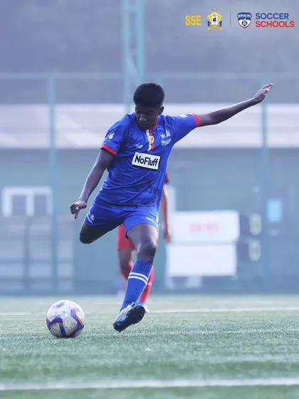 A player strikes the ball with power and technique. Our training is designed to build players who are confident and decisive in key moments of the game.