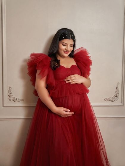 A detailed look at the bodice of the Lorna gown. The sweetheart neckline and layered ruffles are incredibly flattering and add a romantic touch.