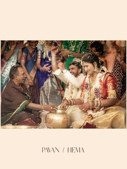 The wedding games begin! A candid shot of the couple and their family enjoying the traditional post-ceremony rituals.