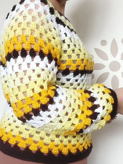A side view of the Trinity Sweater, showing the construction of the balloon sleeves.