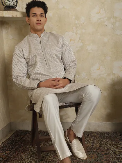 This light grey kurta with a subtle geometric print is another one of my stylish options for summer occasions, keeping you cool while looking sharp.