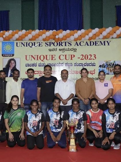 One of the finalist teams from the Unique Cup 2023, posing with their trophy after a hard-fought tournament.