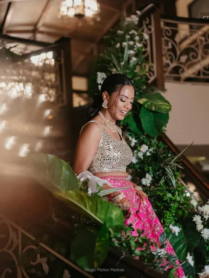 A breathtaking look for a cocktail event. The makeup was kept very natural to feel like her own skin, paired with a sleek ponytail. This ensures the bride feels comfortable and can enjoy her event to the fullest while looking absolutely stunning.