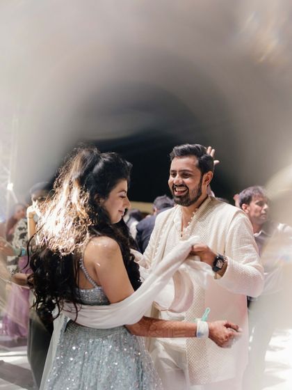 A Fairytale Sangeet: This look was all about magical details, from the pearl-encrusted lehenga to the Bridgerton-inspired curls, creating a dreamy, enchanting vibe.