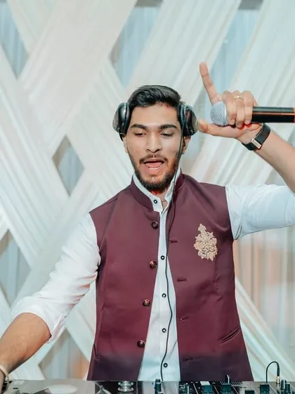 Mic in hand, ready to hype the crowd. I'm not a DJ who just hides behind the laptop; I'm an active part of the party.