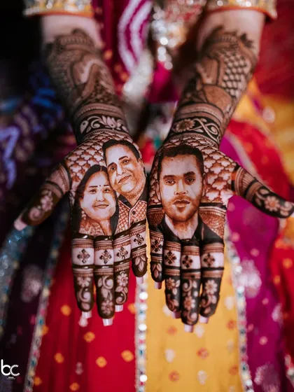 Your love story, told in the most intricate detail. This bride chose to honor her parents and her groom with stunningly realistic portraits incorporated into her bridal mehendi design.