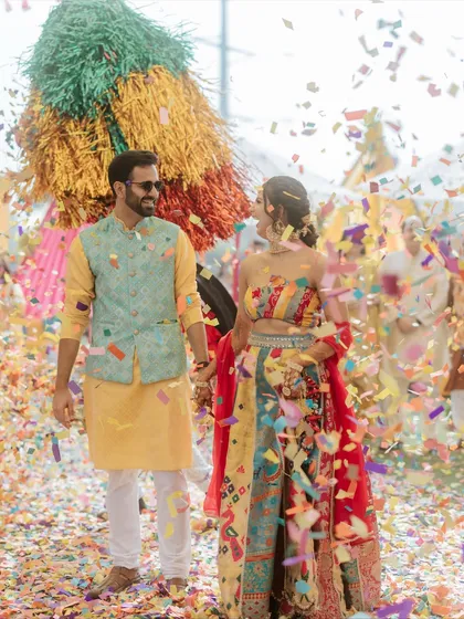 A romantic look shared between the couple amidst the confetti shower. These are the moments we strive to create.