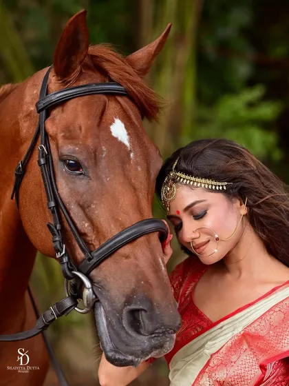 An intimate moment between Sauraseni and the horse. This gentle and emotional shot adds a layer of softness and narrative to the high-fashion editorial.