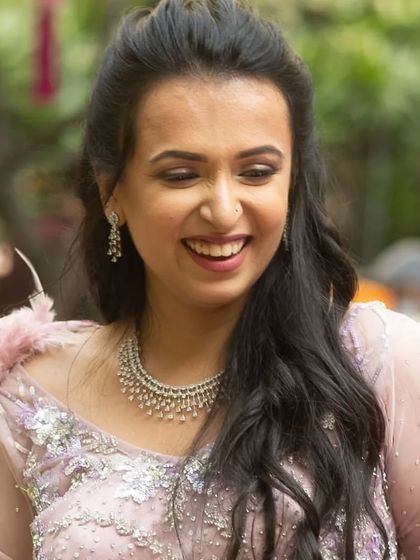 Another shot of this client's infectious smile. Her soft, natural makeup look is perfect for a daytime event.