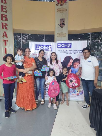 More happy families celebrating their artistic achievements at our community event. The support and encouragement within the group is always inspiring to see.